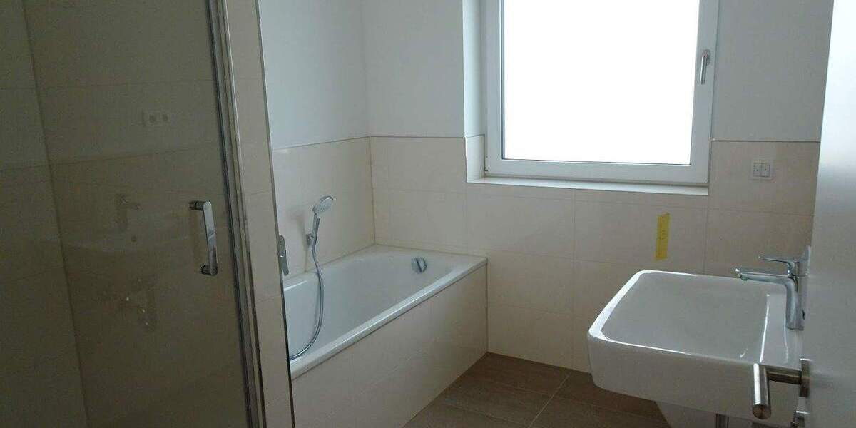 Terrassen-Wohnung im NEUBAU: 3 Zimmer + Einbauküche + Tageslichtbad + Gäste-WC + TG-Platz 3 zimmer