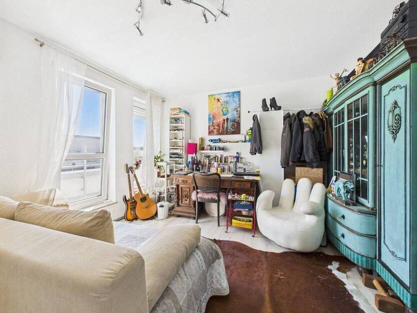 Lichtdurchflutete 3-Zimmer-Wohnung mit umfassender Dachterrasse und Tiefgaragenstellplatz