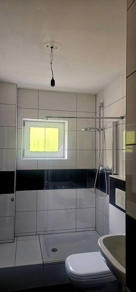 TOP 2 ZKB ETW in Zeppelinheim, mit Balkon und Gartenanteil