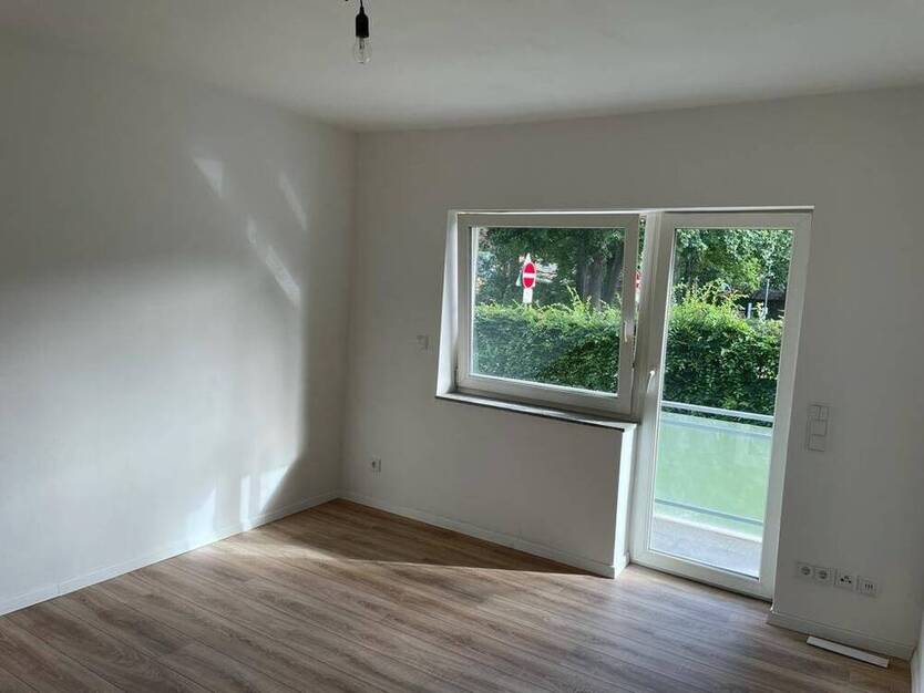 TOP 2 ZKB ETW in Zeppelinheim, mit Balkon und Gartenanteil