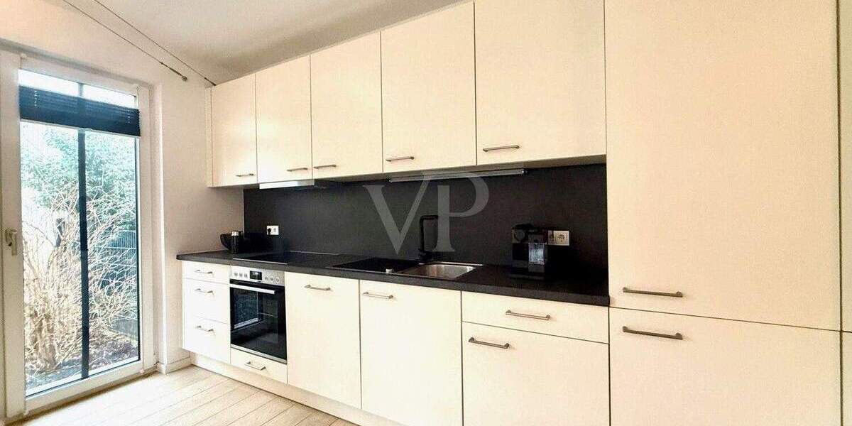 Hochwertige Gartenwohnung mit Westterrasse und Garage 2 zimmer