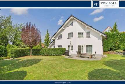 Haus zum Kaufen in Nieder-Olm 1.395.000 € 210 m²