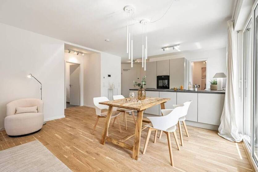 3 Zimmer-Wohnung mit eigenem Garten, Einbauküche und Tiefgaragenstellplatz