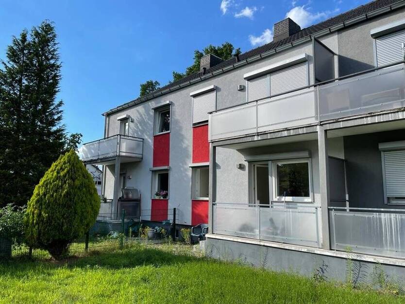 TOP 2 ZKB ETW in Zeppelinheim, mit Balkon und Gartenanteil