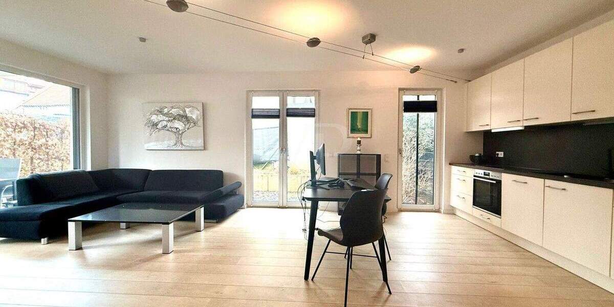 Hochwertige Gartenwohnung mit Westterrasse und Garage 2 zimmer