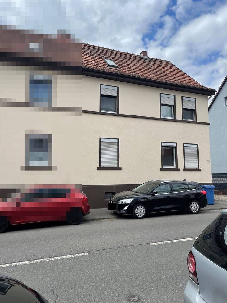 Doppelhaushälfte mit 3 Whg, Anbau und 4 Garagen
