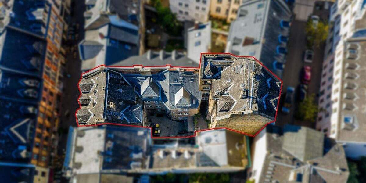 Mehrfamilienhaus mit zwei Gewerbeeinheiten in zentraler Innenstadtlage 2 zimmer