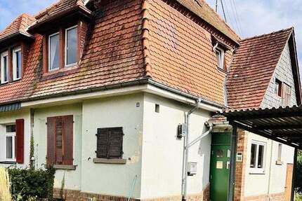 Kompakte Doppelhaushälfte zum Renovieren in Zeilsheim 3 zimmer