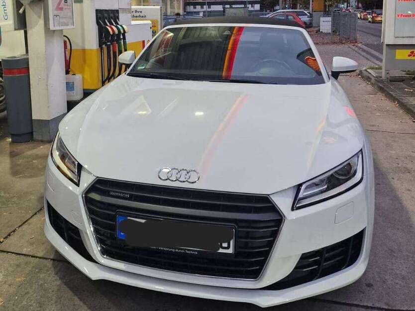 TT