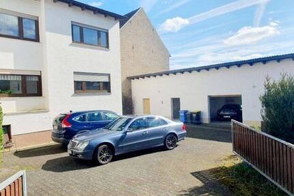 Super für die Großfamilie und Autofreunde, nur 14 Minuten bis Idstein, viele Garagen+ großer Garten 7 zimmer