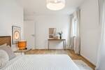 3 Zimmer-Wohnung mit eigenem Garten, Einbauküche und Tiefgaragenstellplatz