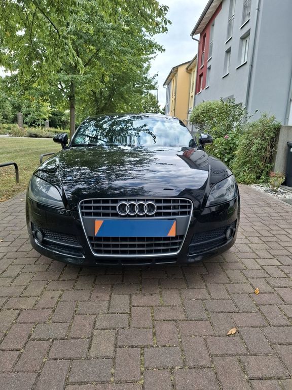 TT
