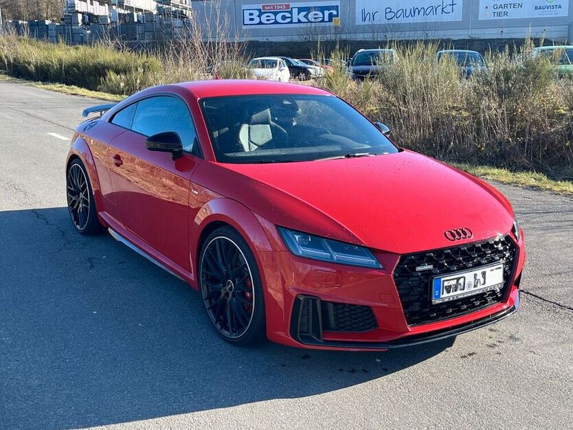 TT