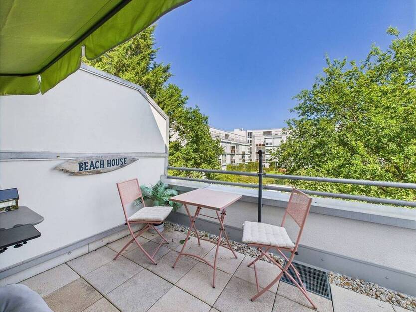 Lichtdurchflutete 3-Zimmer-Wohnung mit umfassender Dachterrasse und Tiefgaragenstellplatz