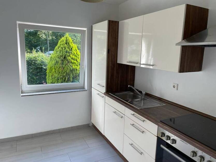TOP 2 ZKB ETW in Zeppelinheim, mit Balkon und Gartenanteil