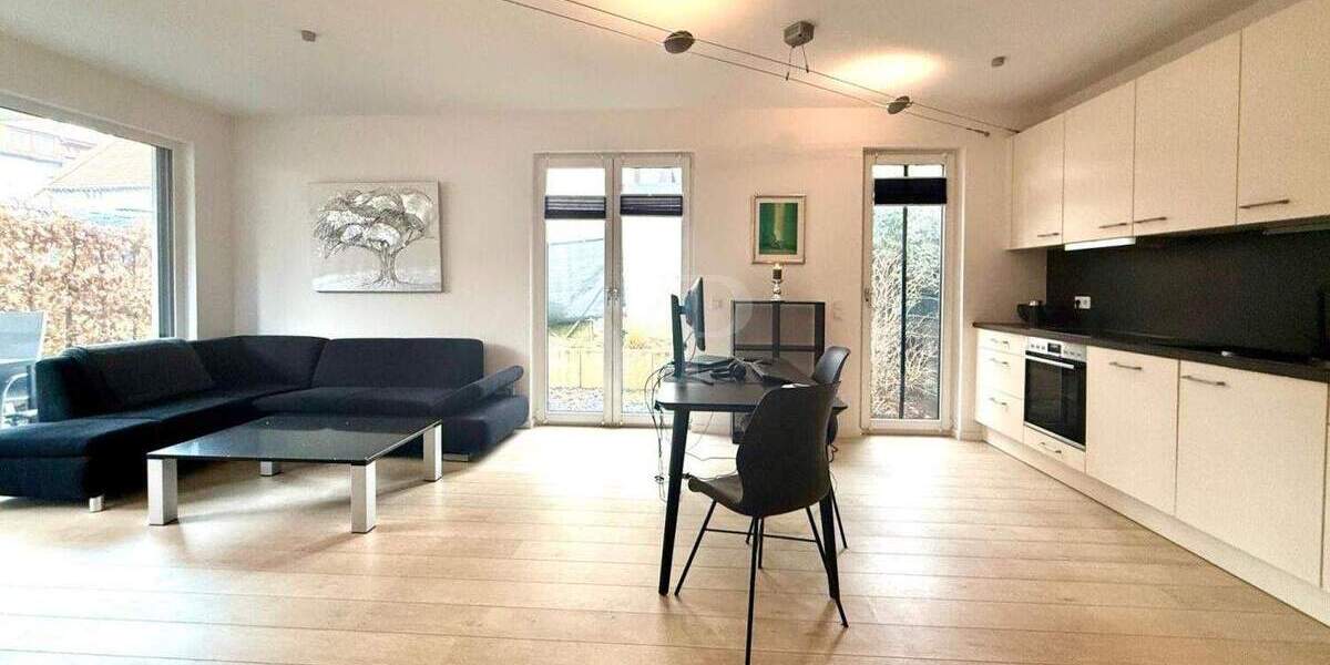 Hochwertige Gartenwohnung mit Westterrasse und Garage 2 zimmer