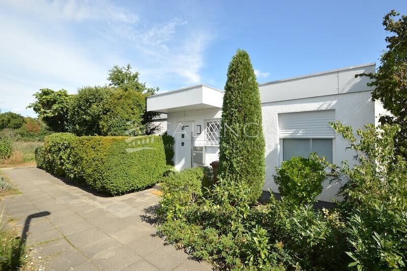 FALANGA ImmobilieN-Begehrter großer Bungalow in prima Zustand und top Grünlage in Mörfelden-Walldorf